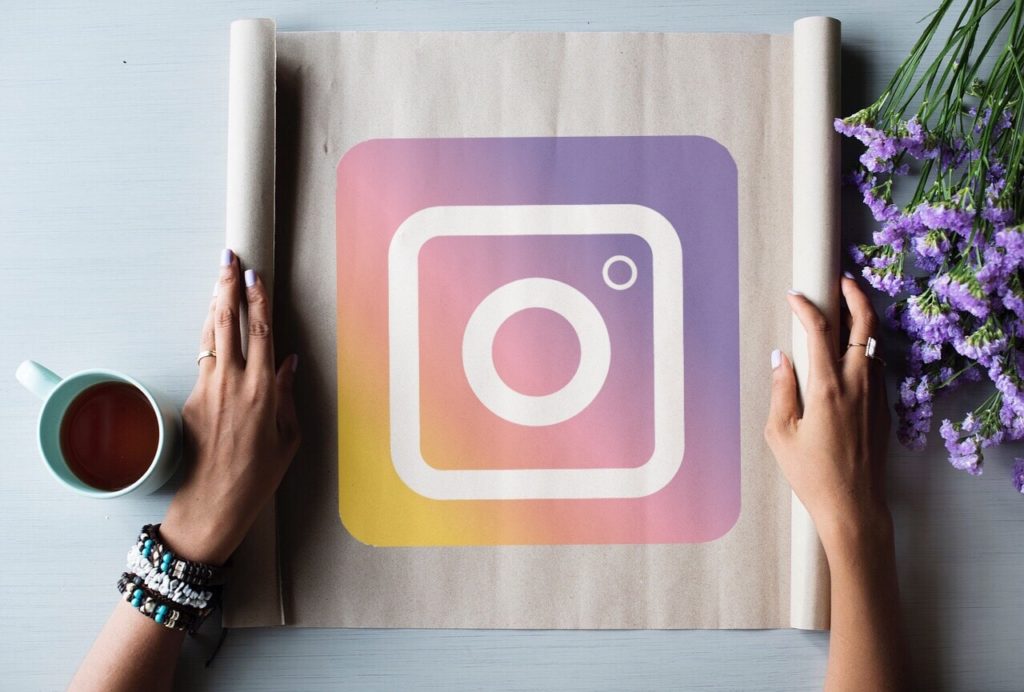 Instagram logo on table with flowers